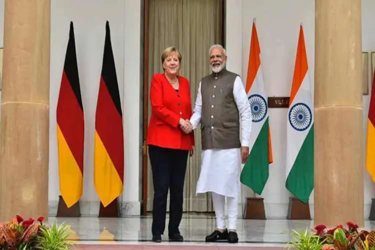 indo german consultations, india germany meeting, angela merkel visit to india, angela merkel meet modi, 5th indo-german inter-governmental consultations, indian express news