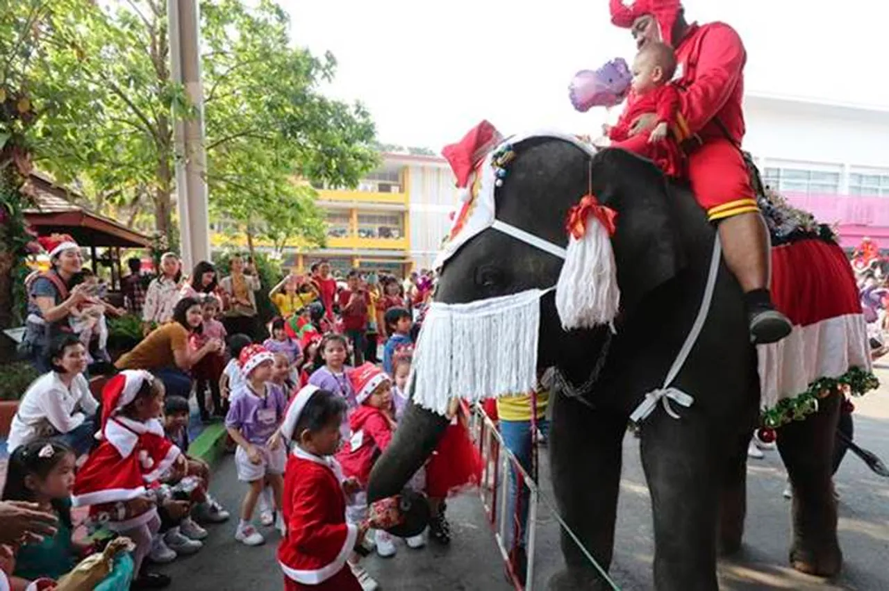 Christmas 2019 Viral video Elephants turn Santa for children in Thai school