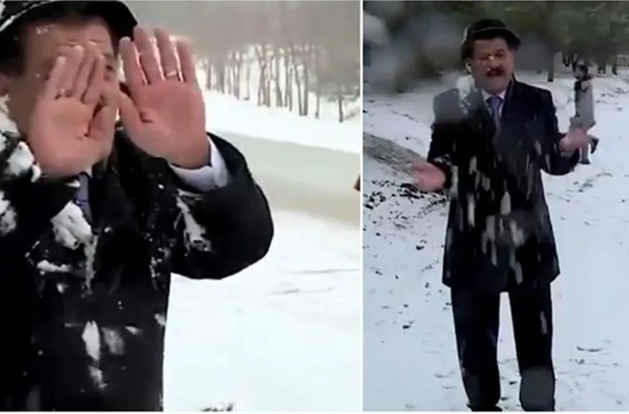 Viral Trending Video weatherman braving snow attack