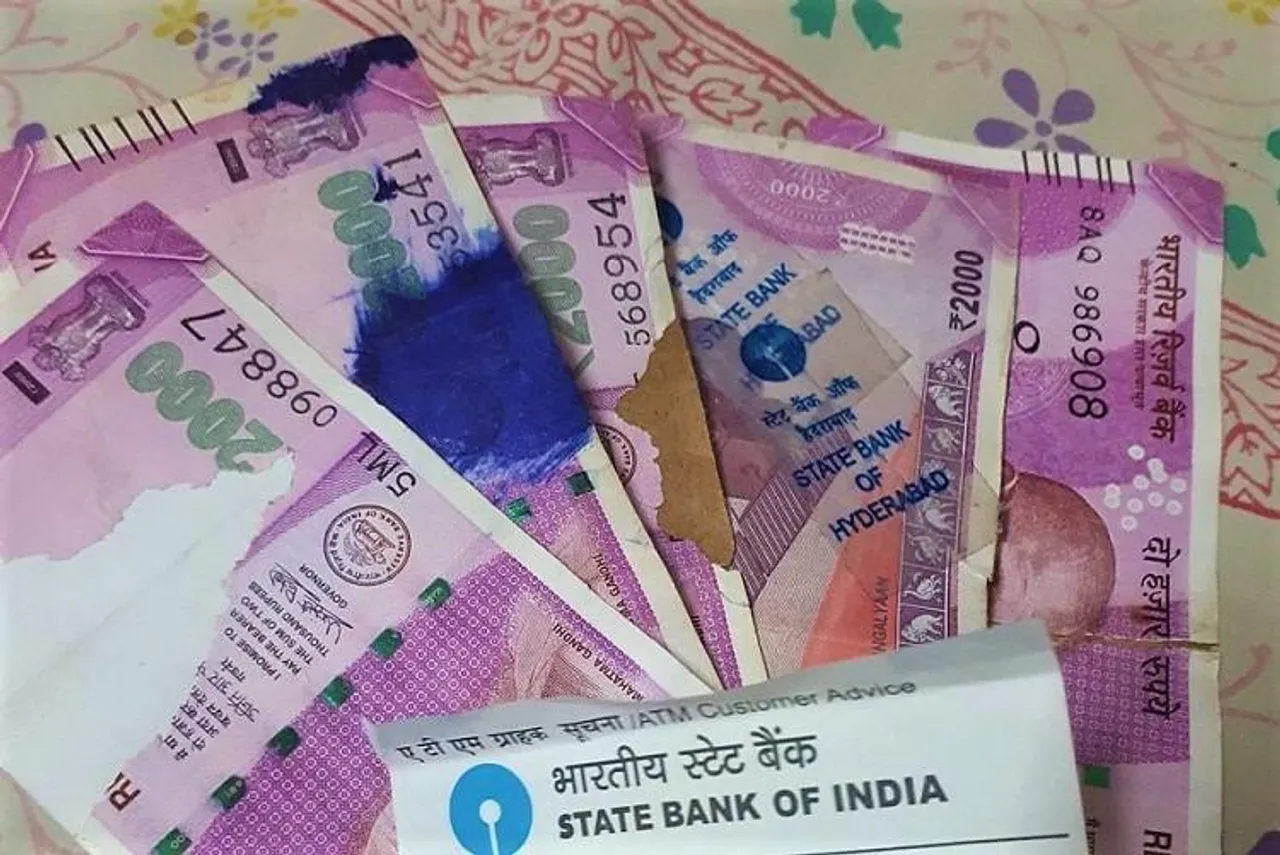 SBI accepts old damaged currency notes