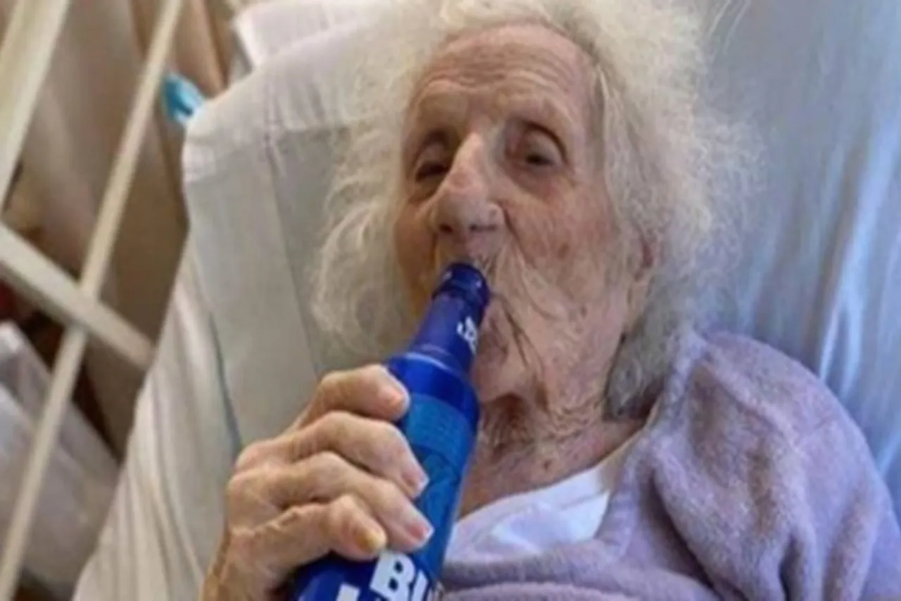 103-year-old woman celebrates with beer after beating COVID-19