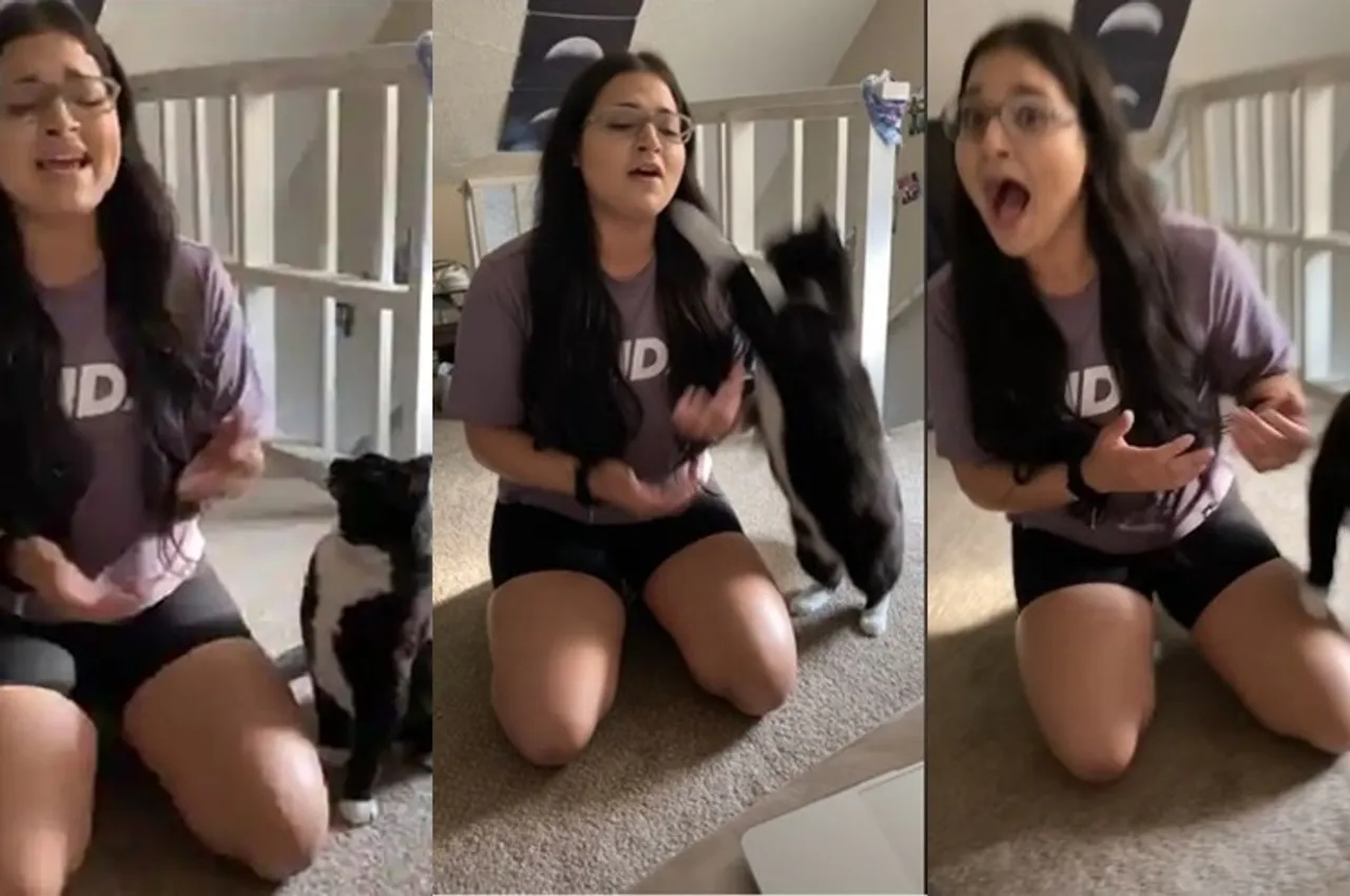 Trending viral video of cat shuts a woman who is singing next to him in the rudest way