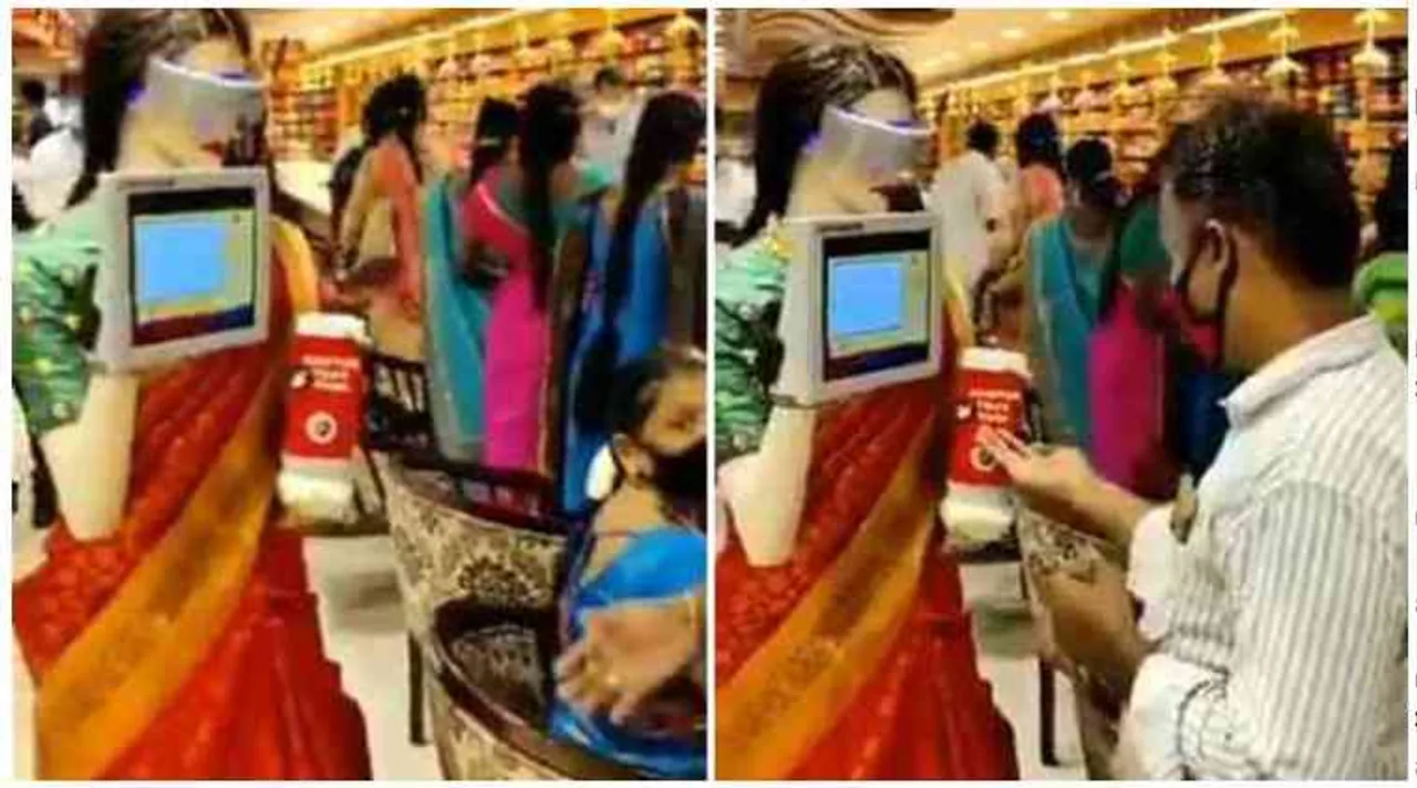 textile showroom women robot provides sanitizers, tamil nadu textile showroom, women robot provides sanitizers to customers, தமிழ்நாடு ஜவுளிக்கடை, வாடிக்கையாளர்களுக்கு சானிடைஸர் விநியோகிக்கும் பெண் ரோபோ, பெண் ரோபோ, வைரல் வீடியோ, women robot in saree, robot detects customers provide hand sanitisers, viral video, tamil viral news, tamil viral video news, latest trending video, technology videos