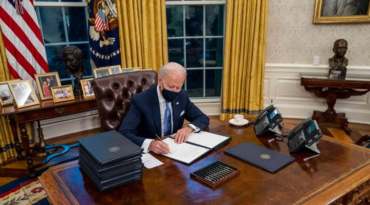 Joe Biden signs 17 orders to undo Donald Trump Legacy Biden Day 1 Tamil News