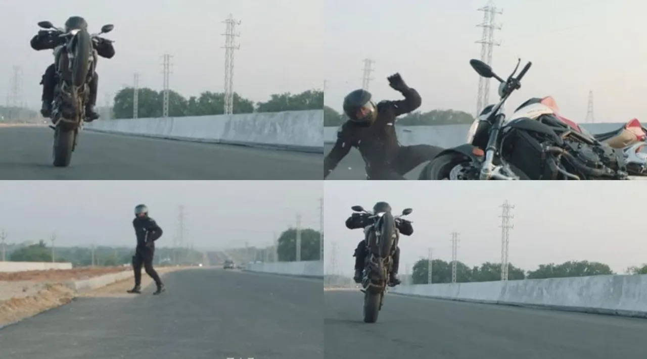 Ajith Kumar stumble and fall from bike, Ajith fall and rise again, Valimai making video, பைக்கில் இருந்து விழுந்தாலும் திரும்ப எழுந்து சாகசம் செய்த அஜித், வலிமை மேக்கிங் வீடியோ, வலிமை அப்டேட், அஜித் ஸ்டண்ட், Ajith stunt, valimai, Ajith bike stunt, Valimai making video goes viral, valimai from pongal 2022, valimai release