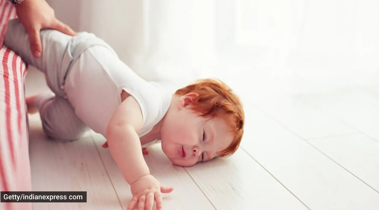 baby falls off the bed