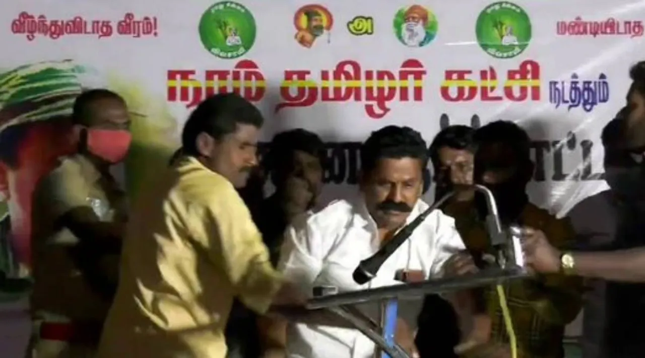 DMK cadres fights with Naam Tamilar Katch cadres, DMK, Dharmapuri, Morappur DMK cadres, NTK Dharmapuri protest stage, நாம் தமிழர் கட்சி, சீமான், நாம் தமிழர் கட்சி கூட்டத்தில் புகுந்த திமுகவினர், தருமபுரி, அரூர், மொரப்பூர் திமுக நிர்வாகி, நாம் தமிழர் கட்சி மேடையில் திமுகவினர் ரகளை, சீமான், சீமான் கண்டனம், NTK, DMK NTK cadres clash, Tamilnadu politics, Arur, Morappur, Seeman condemns, seeman