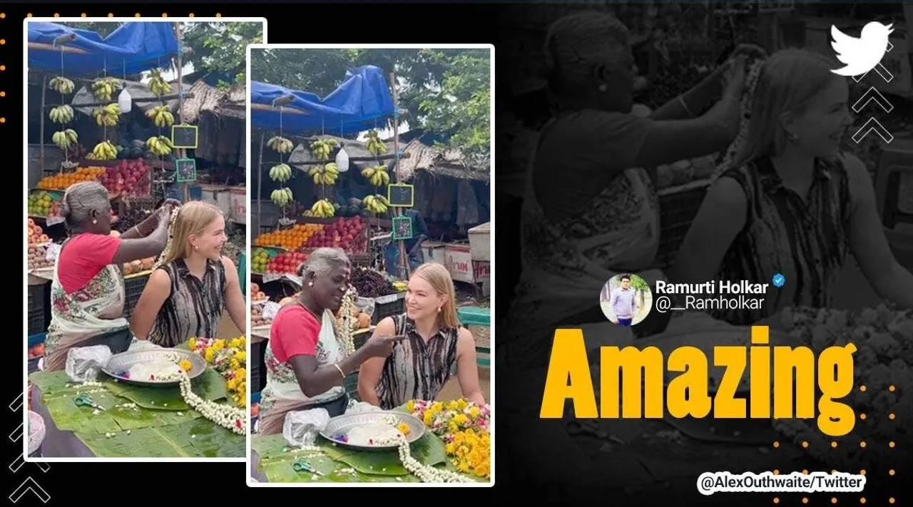 street vendor pins jasmine flower chain on foreigner, madurai, tamil nadu, gajra, jasmine flower chain, Tamil indian express