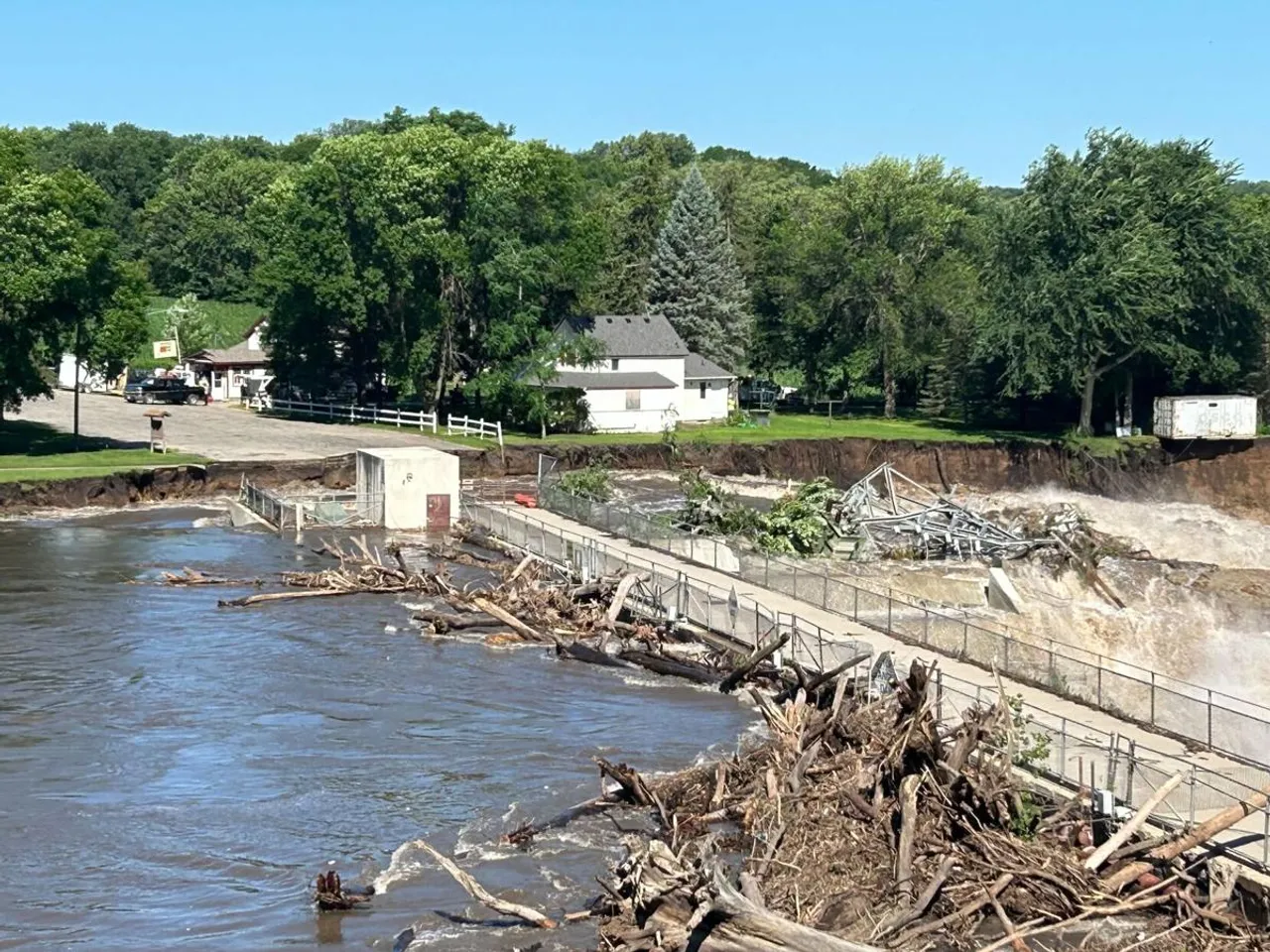 Minnesota's Rapidan Dam is in imminent danger of failure due to accumulated debris and severe flooding.