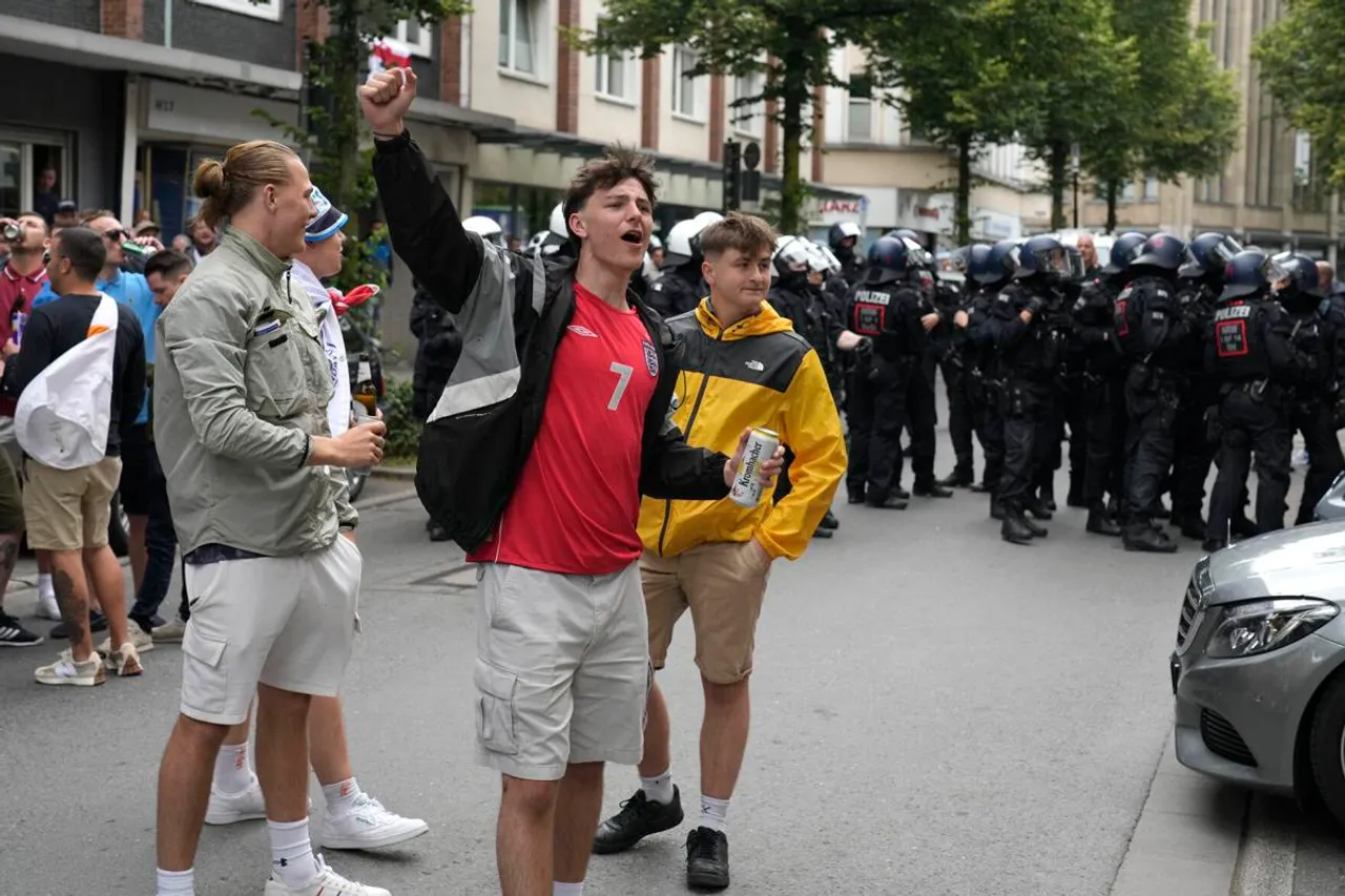 Eight people were temporarily detained following a brawl between Serbia and England fans in Gelsenkirchen, Germany. 