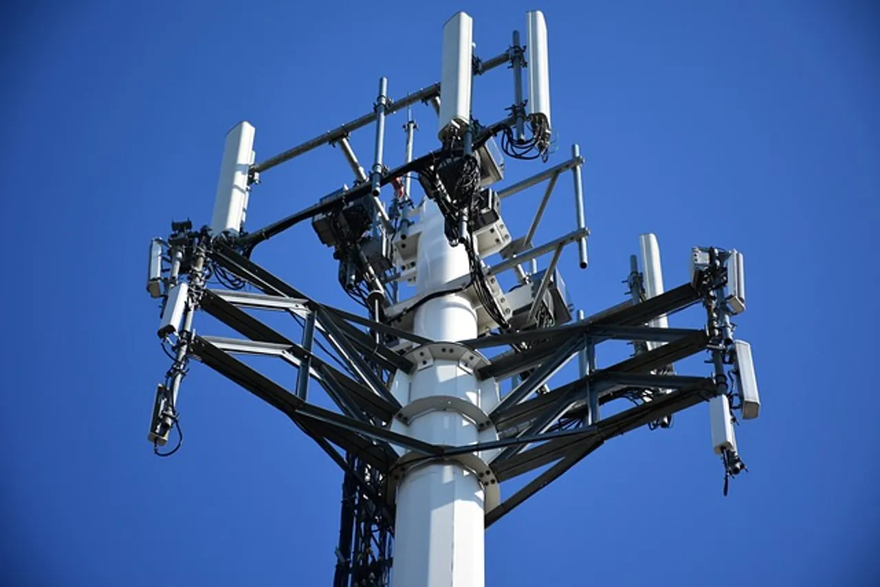  A cell phone tower with numerous antennas, providing strong signal coverage for mobile devices.