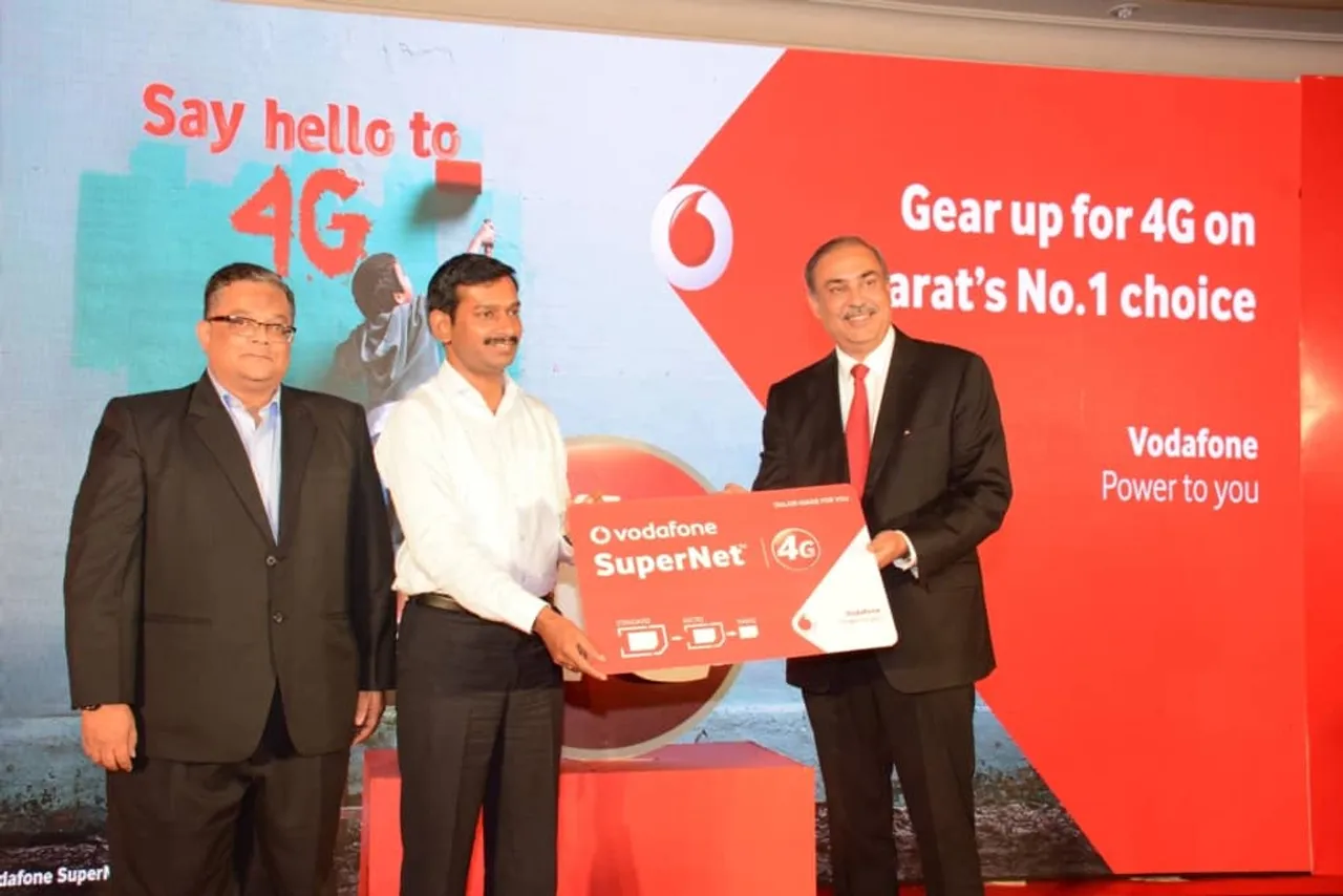 L R Jayesh Gadia Business Head Gujarat Vodafone India Milind Torawane Municipal Commissioner Surat Sunil Sood MD CEO Vodafone India at an event to announce Vodafones G launch in Gujarat at Sura