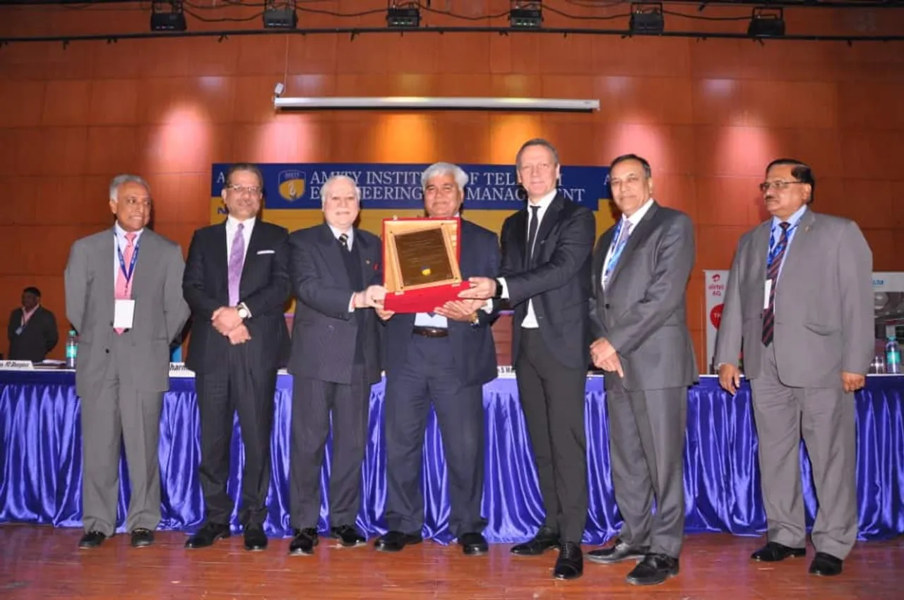 Mr. Paolo Colella CEO MD Ericsson India receiving the award for Top Managed Service Company of the Year