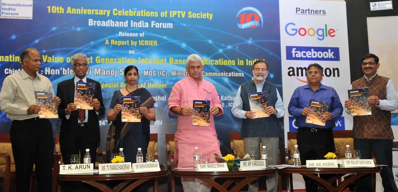 Manoj Sinha releasing the publication at the 10th Anniversary Celebrations of IPTV Society, in New Delhi on July 14, 2017. The Secretary, Ministry of Electronics & Information Technology, Aruna Sundararajan and other dignitaries are also seen.