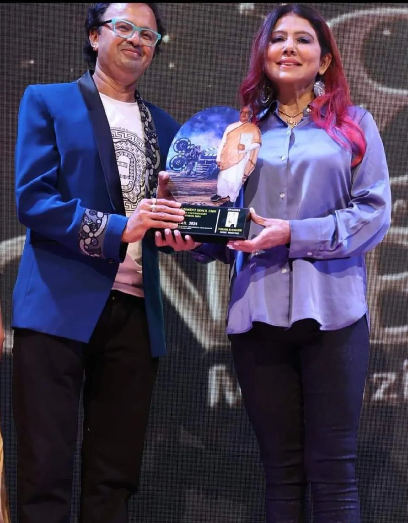DadasahebPhalke C-N (F-C) Awardee  Composer Nikhil Kamath with Tina Ghai, on stage