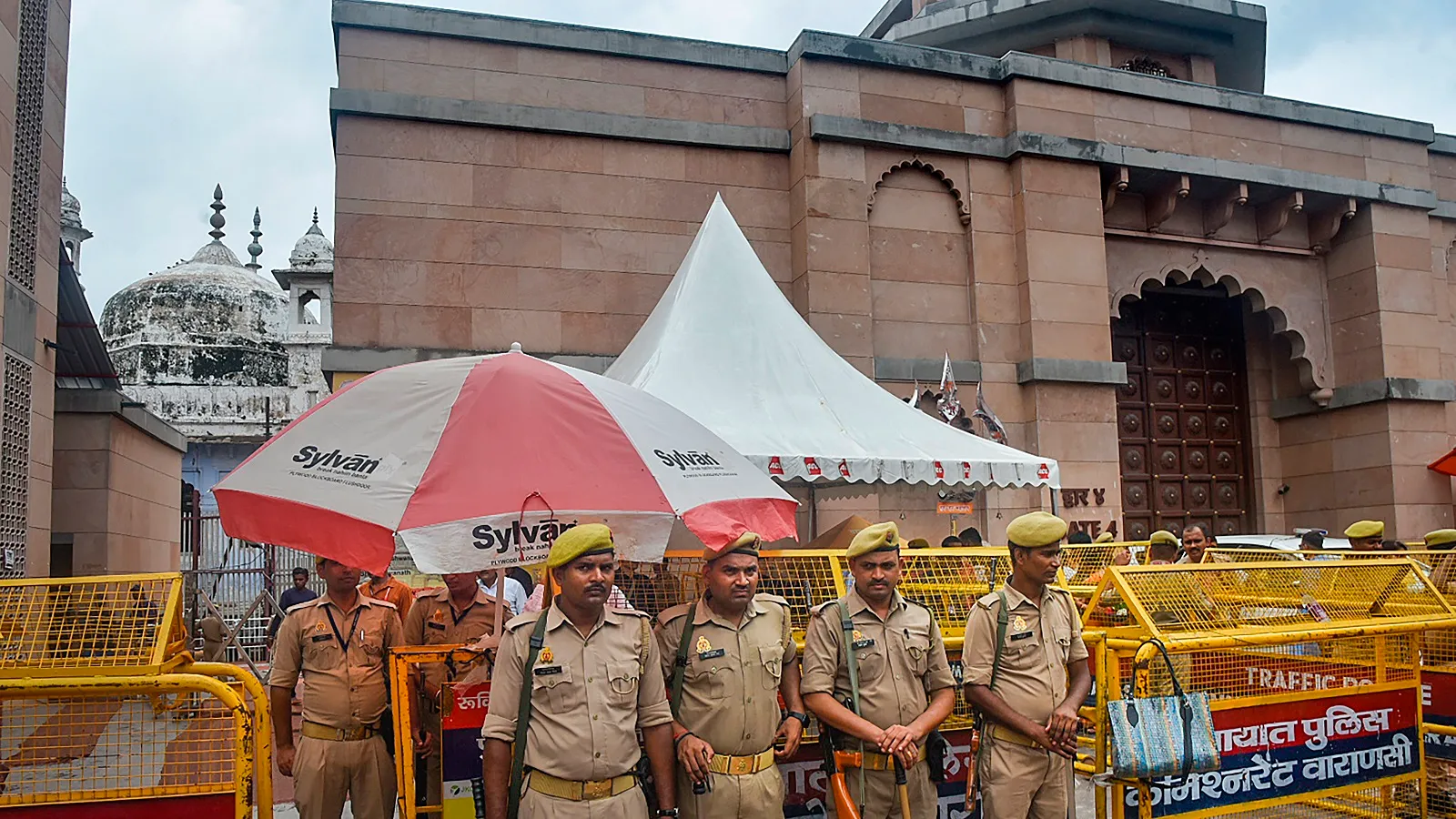 Police personnel stand guard at the Gyanvapi mosque, in Varanasi