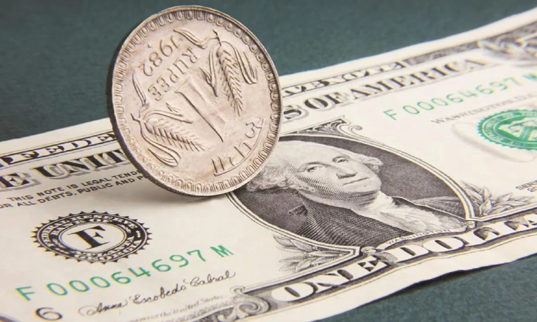 Indian rupee falls to record 86 against dollar, volatility expected