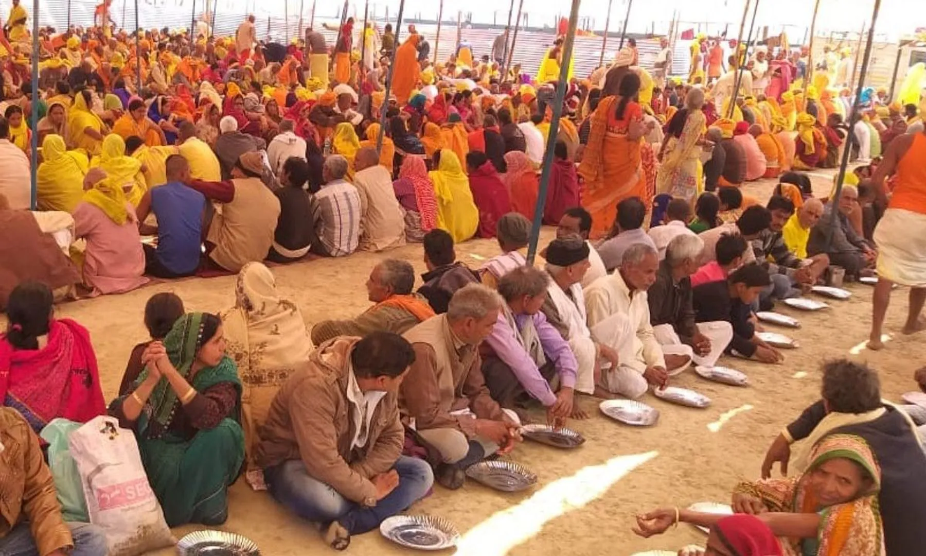 Police officer seen on video 'mixing ash' in food at Maha Kumbh bhandara