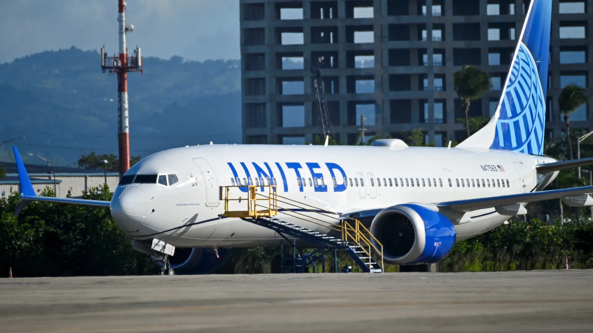 A United Airlines Boeing 737 MAX 9 jetliner is grounded, as passengers try to rebook their tickets from cancelled United Airlines flights after U.S. air safety regulator the Federal Aviation Administration (FAA) grounded 171 Boeing 737 MAX 9 jetliners for safety checks because of the emergency landing of an Alaska Airlines plane, at Luis Munoz Marin International Airport in San Juan, Puerto Rico January 7, 2024.