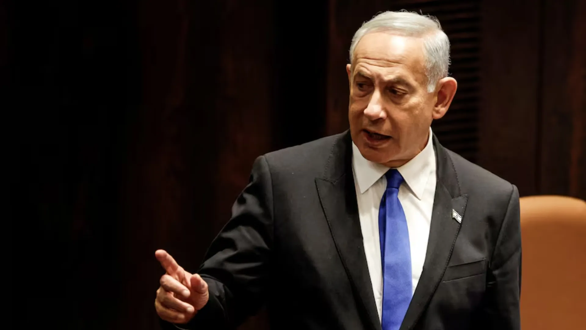 Israeli Prime Minister-designate Benjamin Netanyahu attends a special session of the Knesset, Israel's parliament, to approve and swear in a new right-wing government, in Jerusalem December 29, 2022.