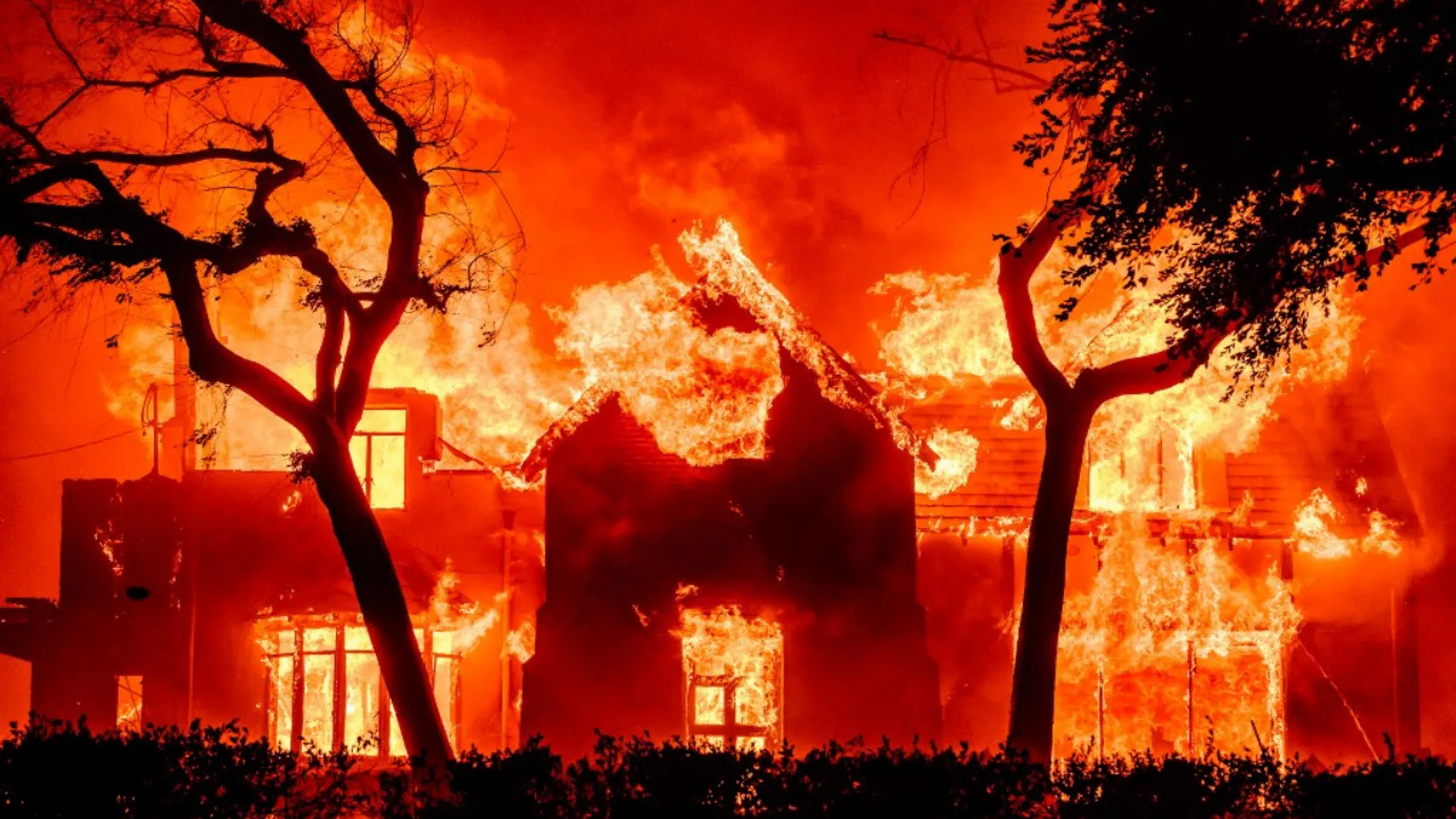 A home is engulfed in flames during the Eaton fire in the Altadena area of Los Angeles County, California on January 8, 2025.