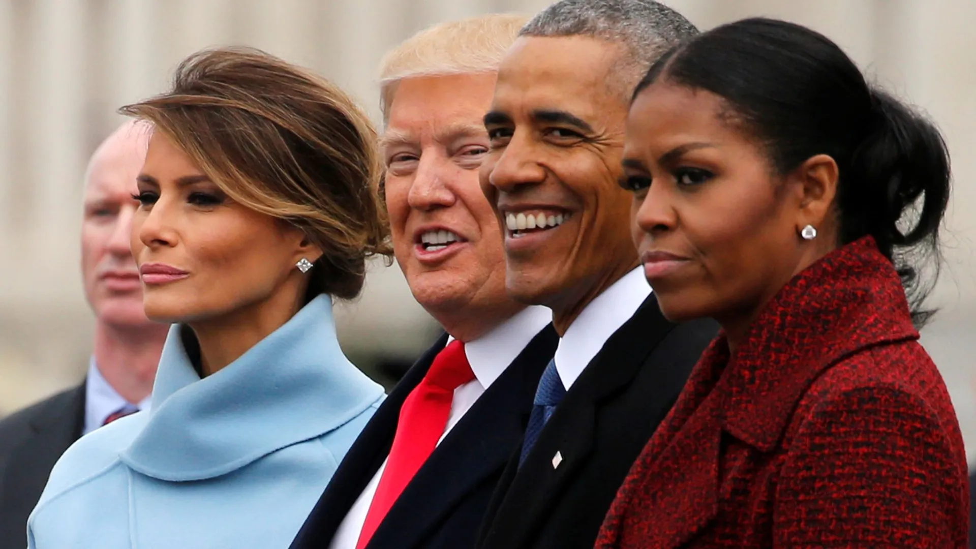 File photo, President Donald Trump and former president Barack Obama stand on the steps of the US Capitol with First Lady Melania Trump and Michelle Obama, in Washington, D.C