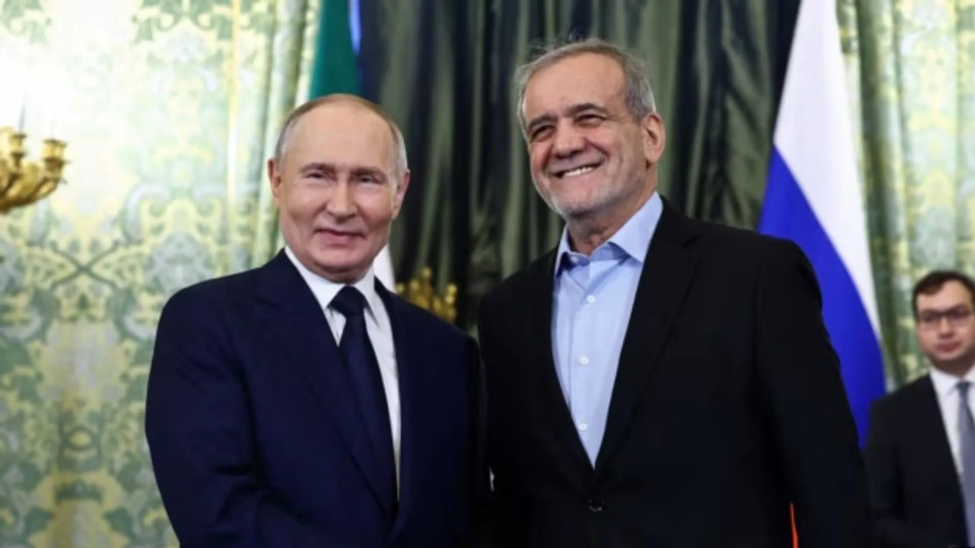 Putin greeted Pezeshkian in a grand Kremlin room Friday