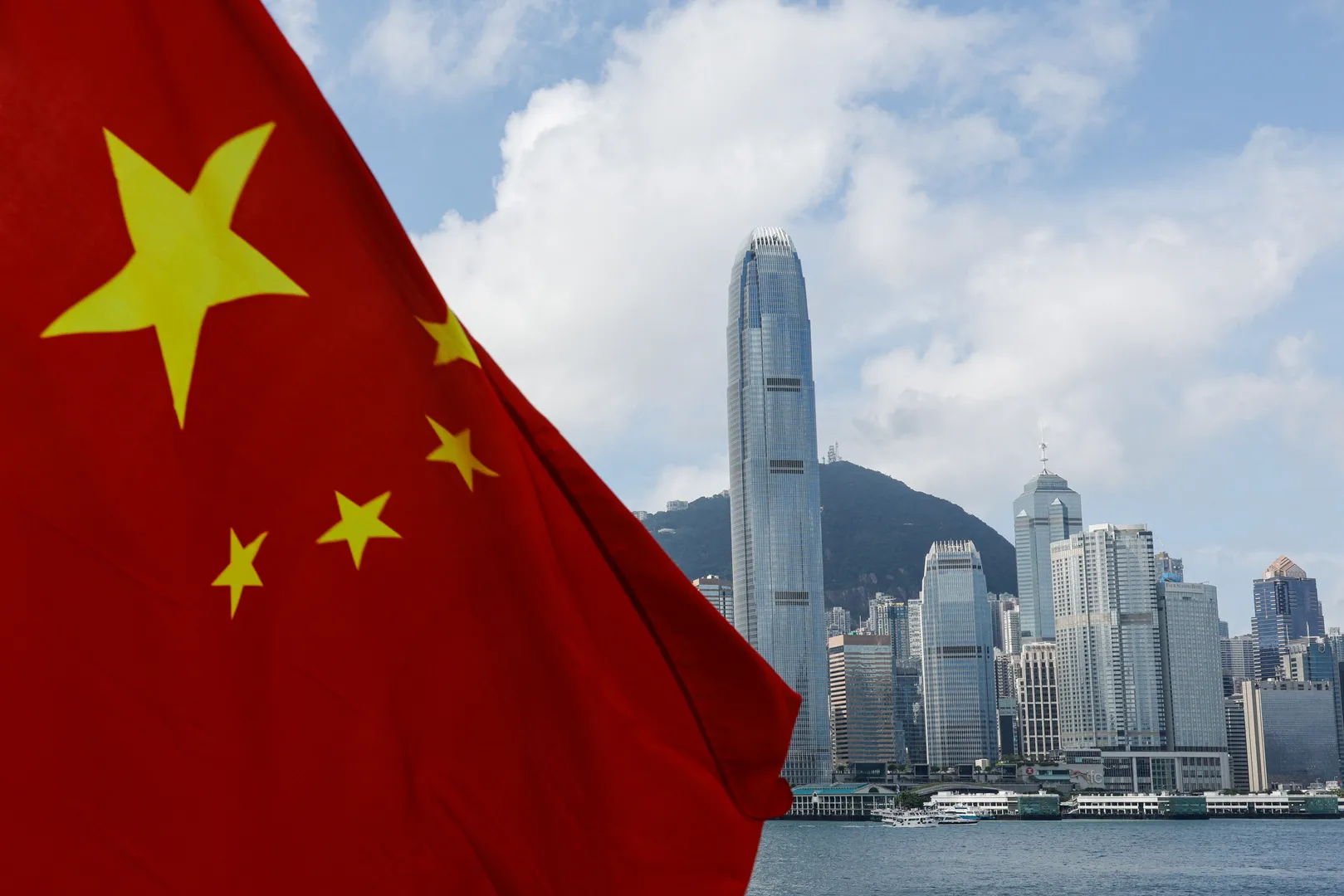 The Chinese national flag is seen in front of the financial district