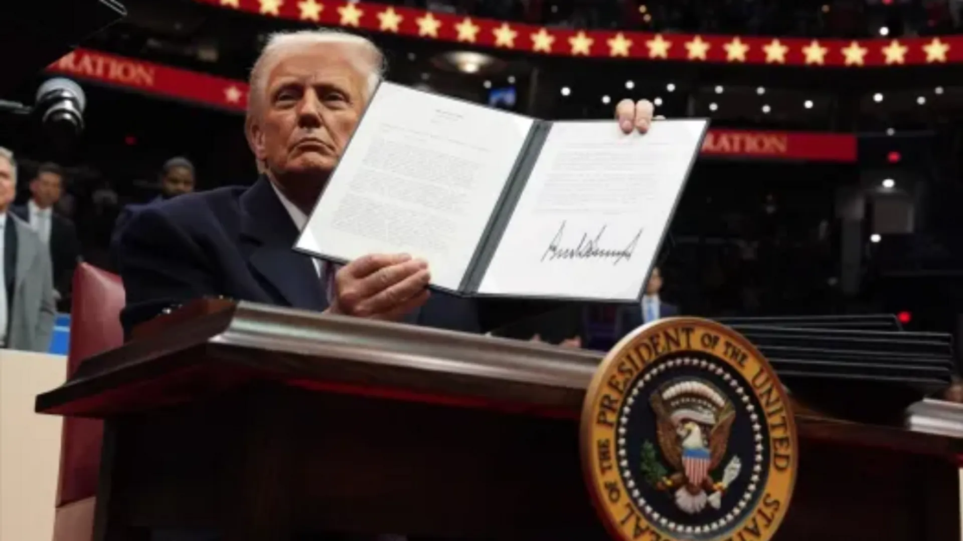 US President Donald Trump holding executive order
