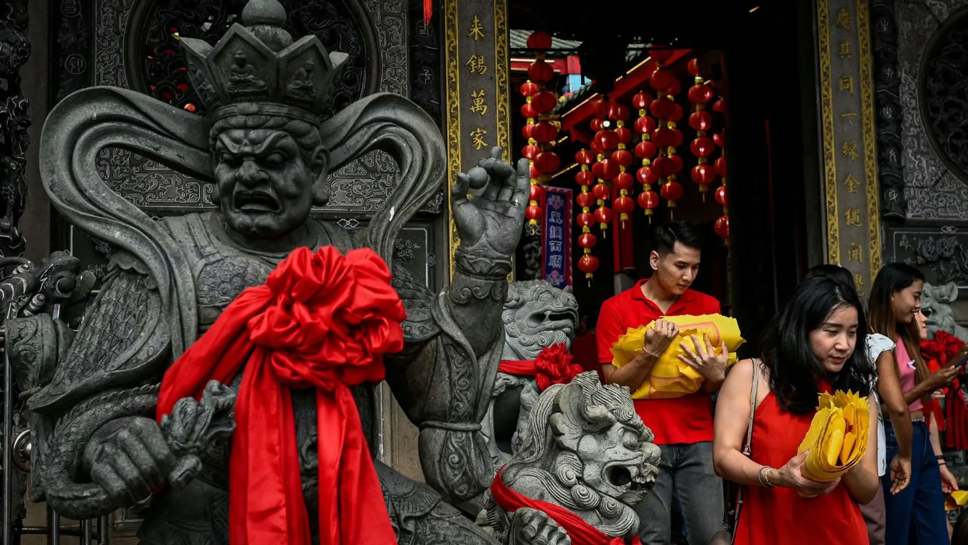 Prayer and dance: hundreds of millions in Asia celebrate Year of the Snake