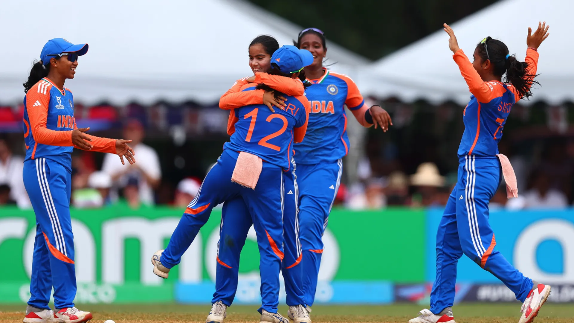Indian players celebrate a wicket
