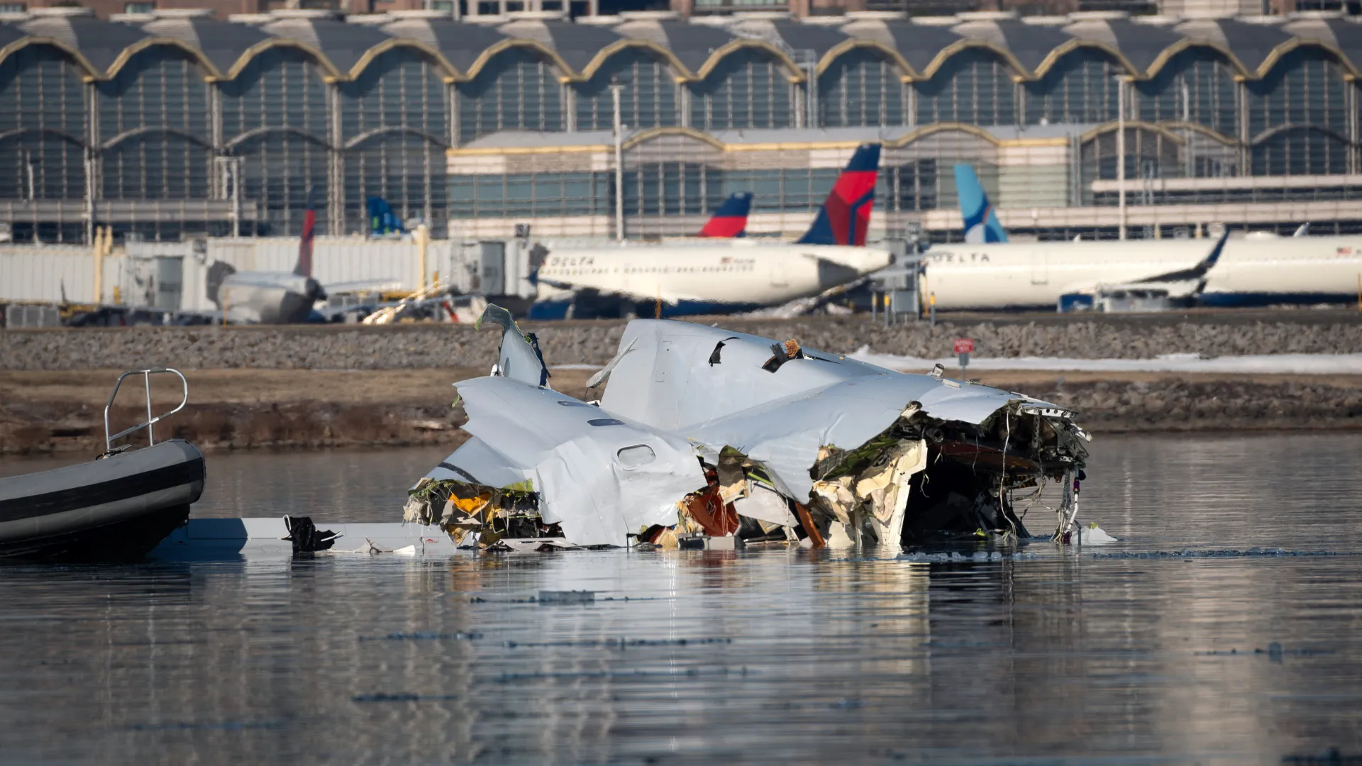 The Coast Guard investigates aircraft wreckage on the Potomac River on January 30, 2025 in Washington, DC.