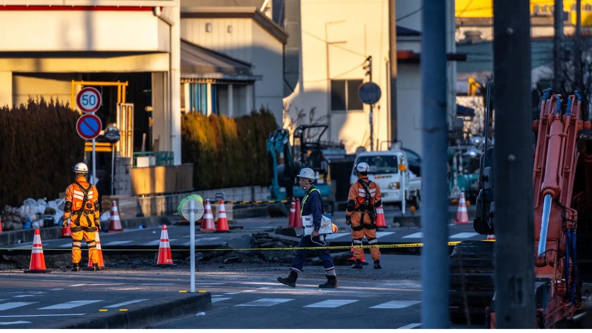 Rescue operations continue for a truck driver after his vehicle plunged into a sinkhole