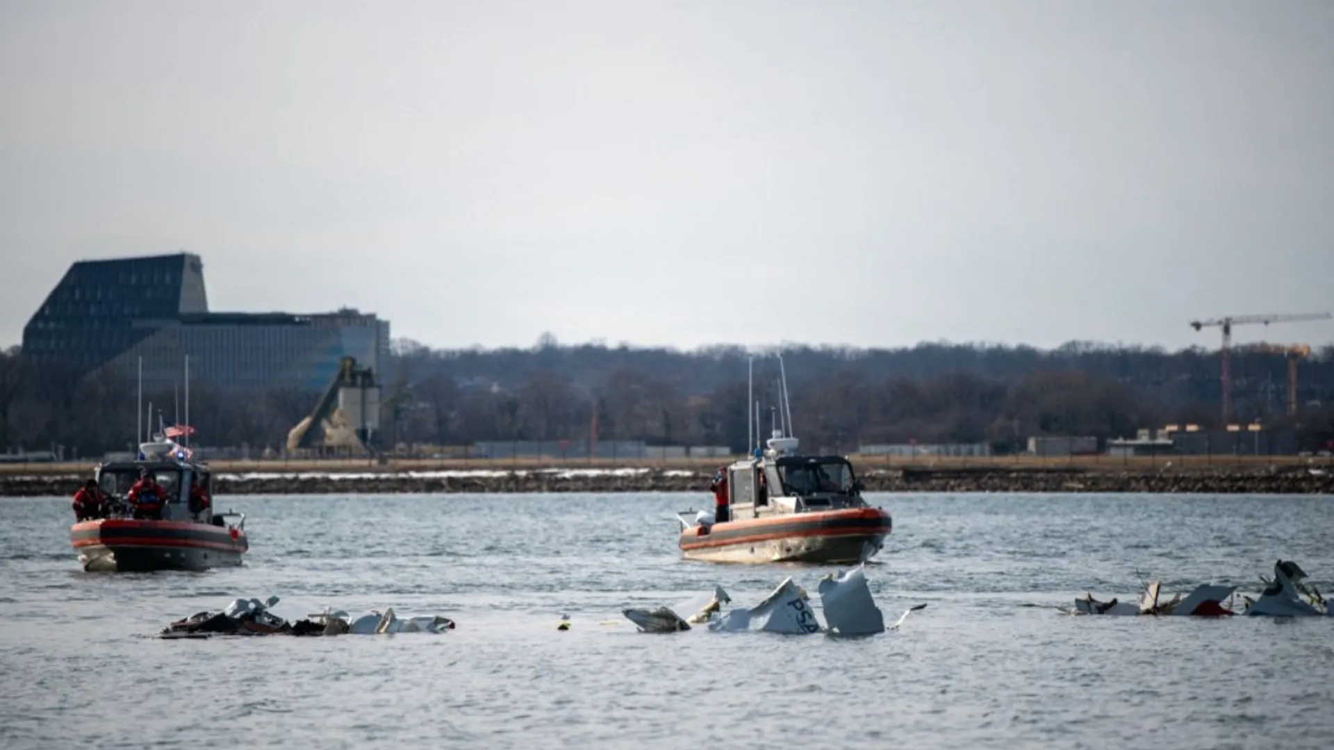 This photo obtained from the US Coast Guard (USCG) shows rescue efforts January 30, 2025, on the Potomac River after American Airlines flight 5342 collided mid-air late January 29 with a US Army helicopter as the plane approached to land at Reagan National Airport, near Washington, DC.