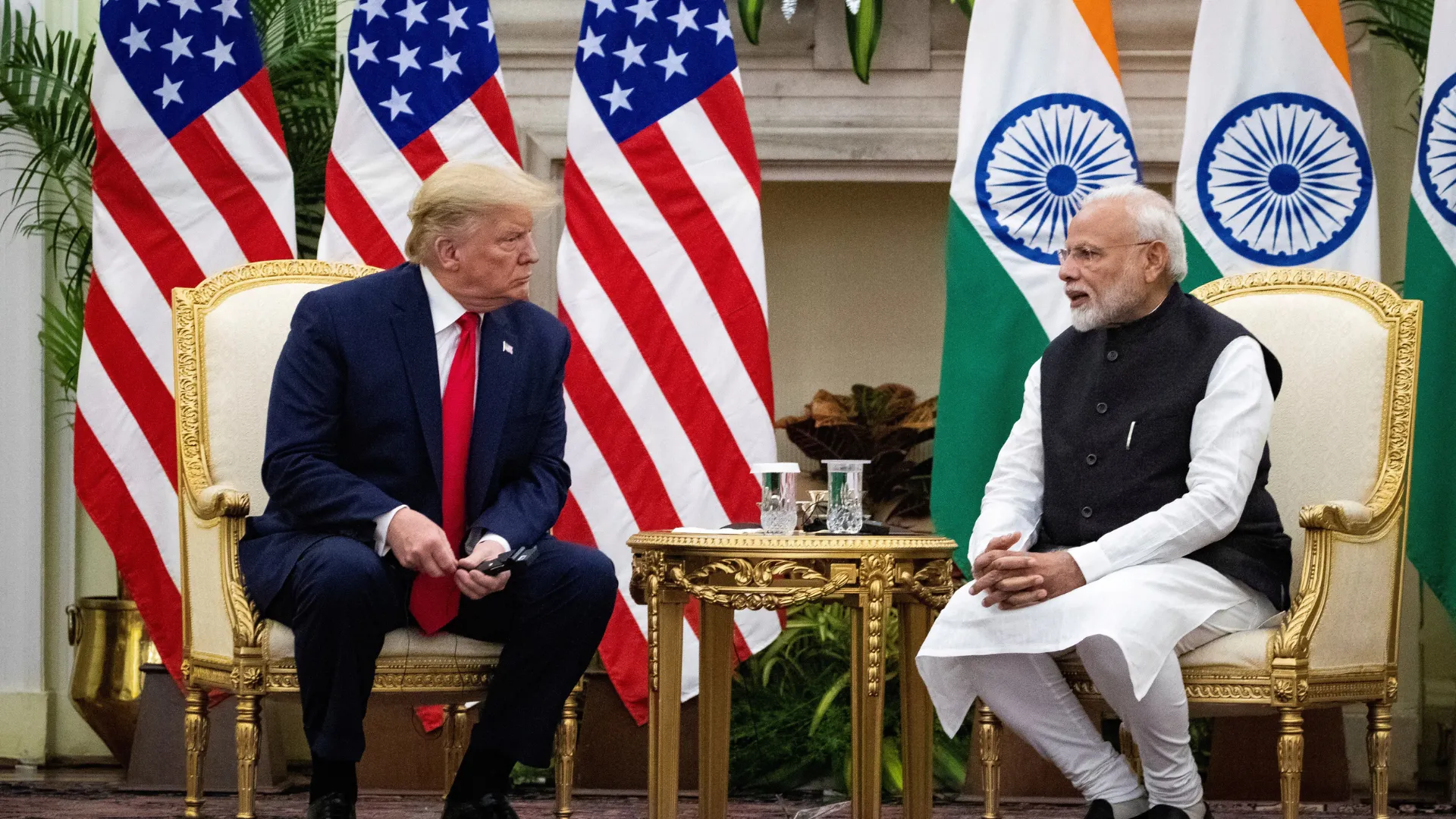 Indian Prime Minister Narendra Modi speaks to U.S. President Donald Trump during a meeting at Hyderabad House in New Delhi, India, February 25, 2020.