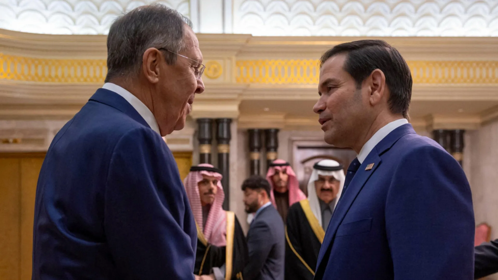 US Secretary of State Marco Rubio (R) shakes hands with Russian Foreign Minister Sergei Lavrov during their meeting at Diriyah Palace, in Riyadh, Saudi Arabia
