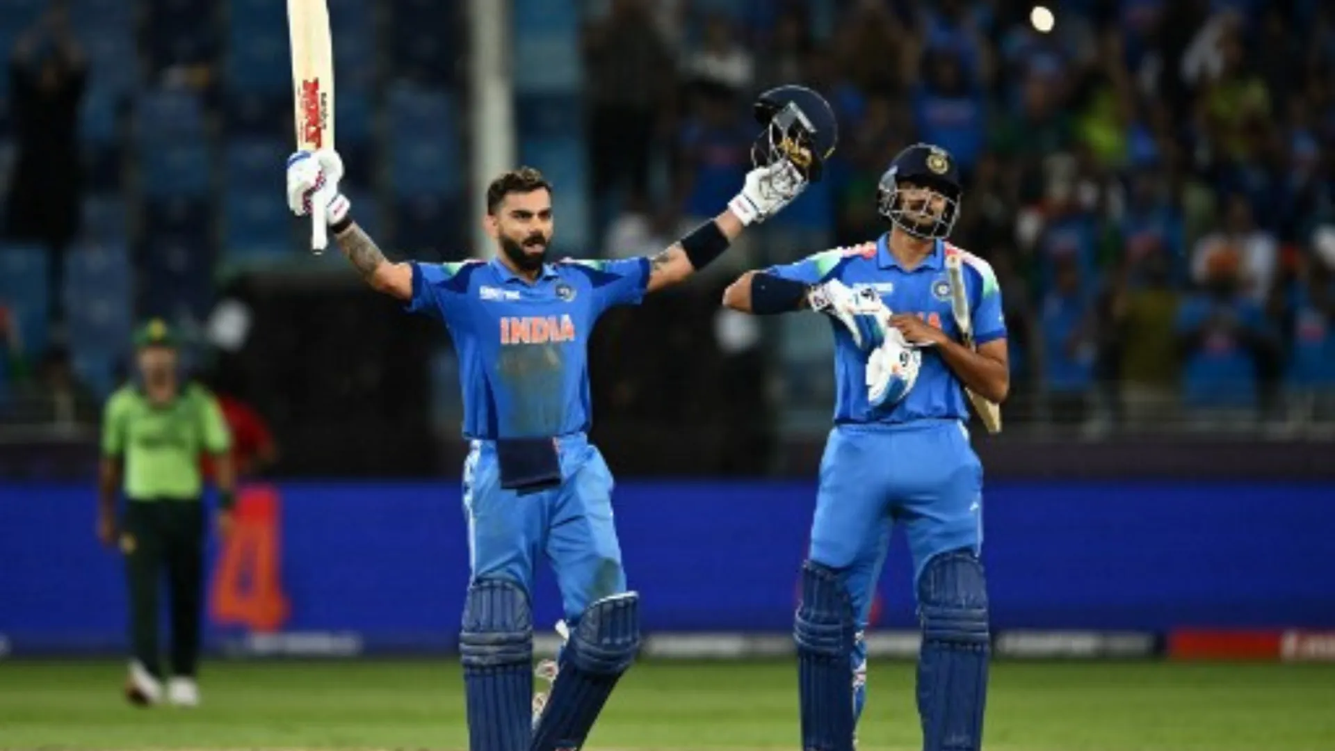 Virat Kohli celebrates his century