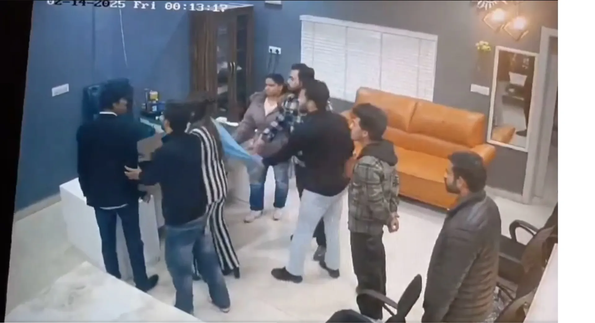 A grab of the viral video of the self-styled pastor assaulting a woman.