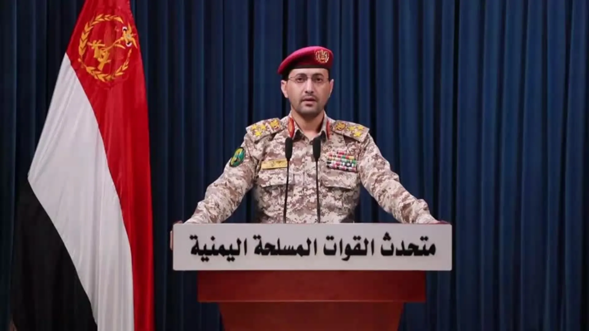 Houthi military spokesperson Yahya Sarea delivering televised statement