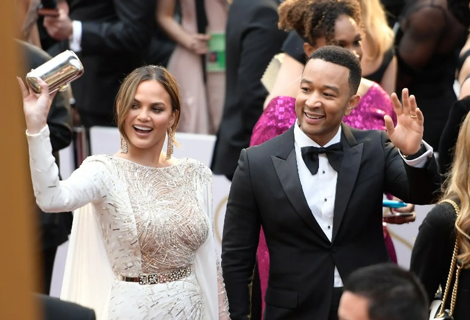 Chrissy Teigen was not aware about her pregnancy during her breast removal surgery
