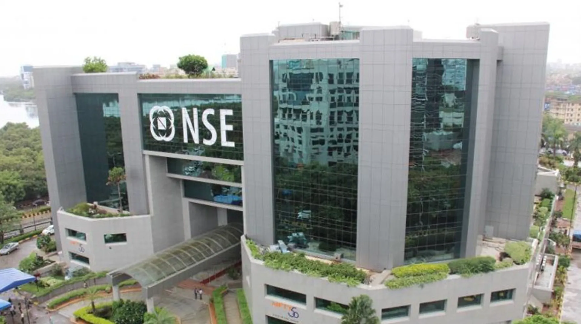 Nifty breaches 10,000 mark for first time