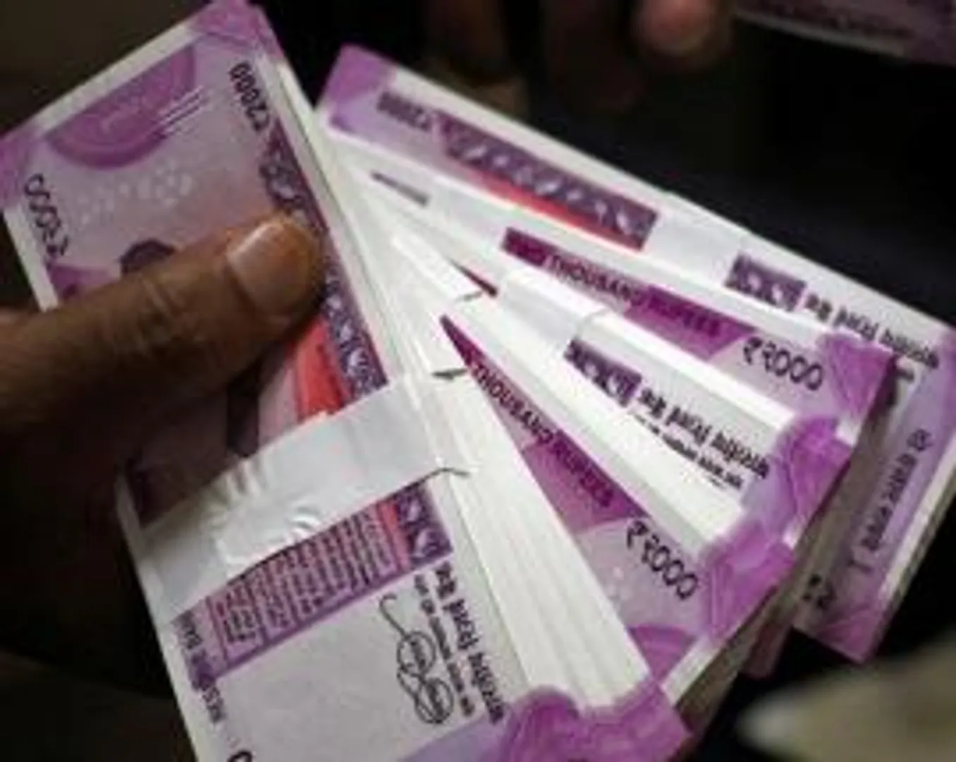 I-T department conducts searches on China's Huawei over tax evasion investigation