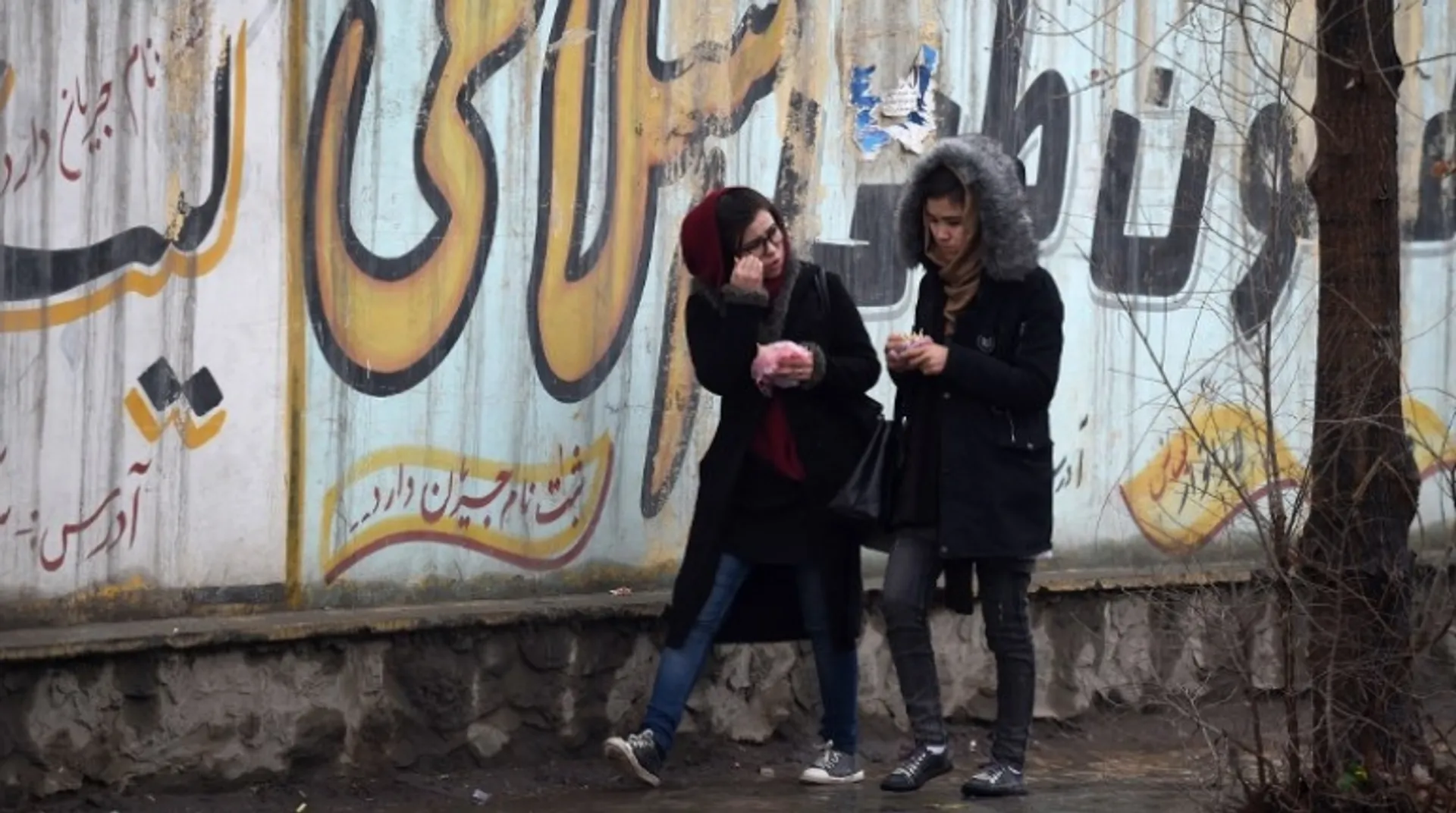 Afghanistan's main universities reopen after six months, few women return