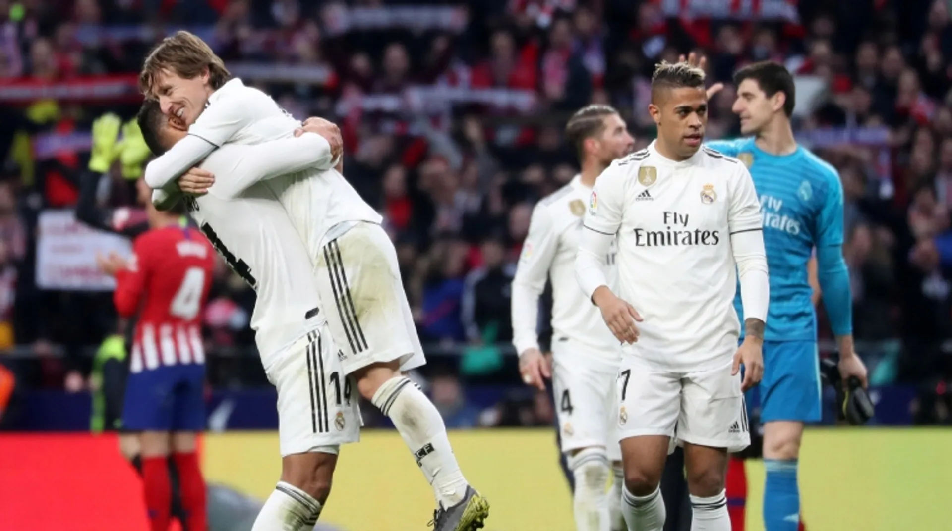 Real win Madrid derby to muscle into title race