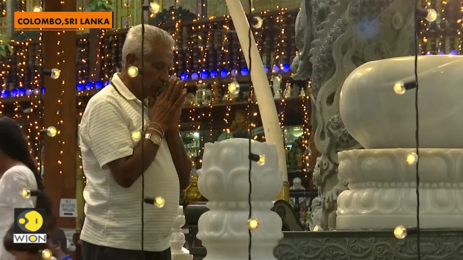 Sri Lanka's PM joins Buddhists marking sombre Vesak after Easter attacks