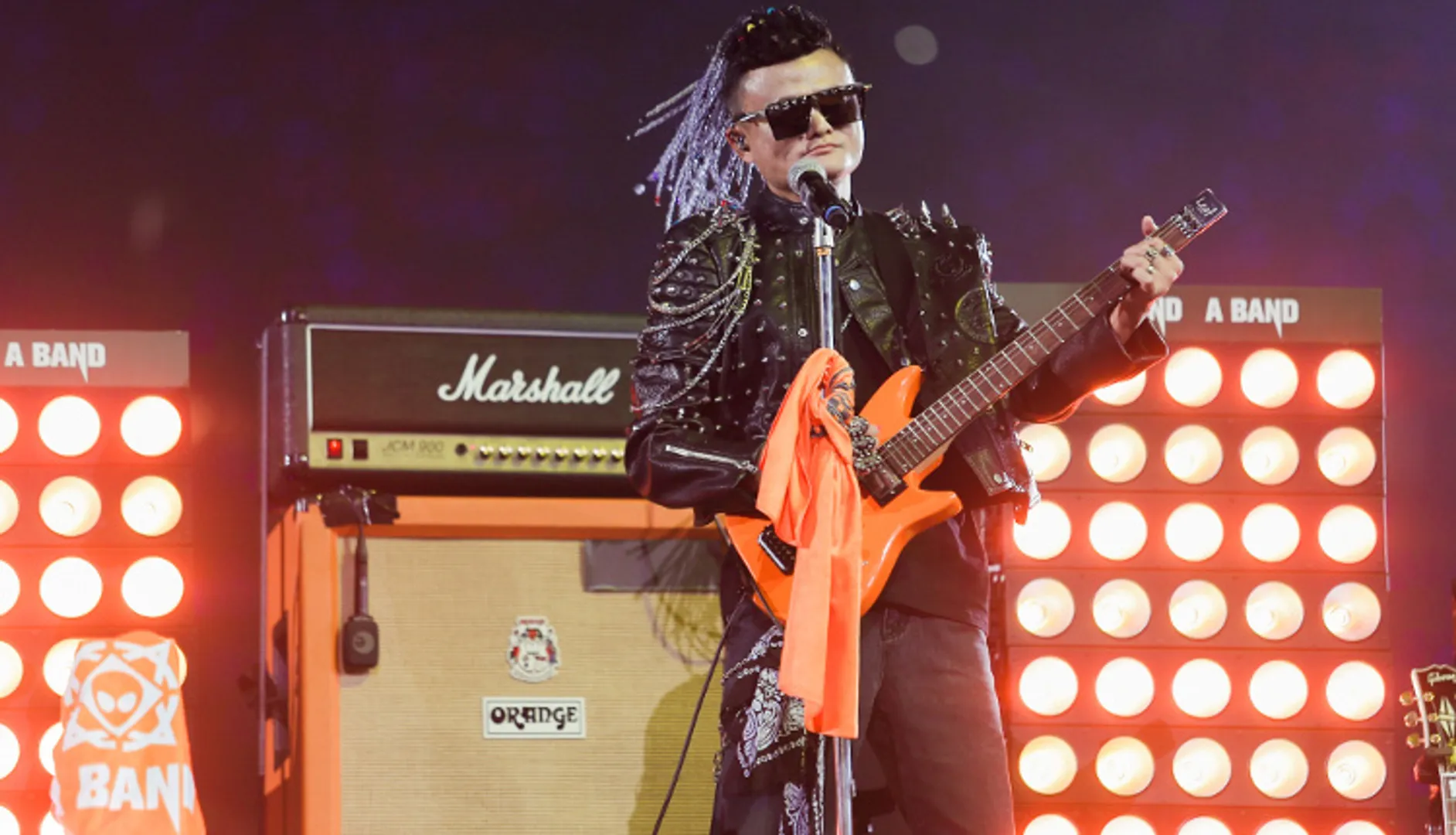 Jack Ma bids tearful farewell to Alibaba with rock star swagger