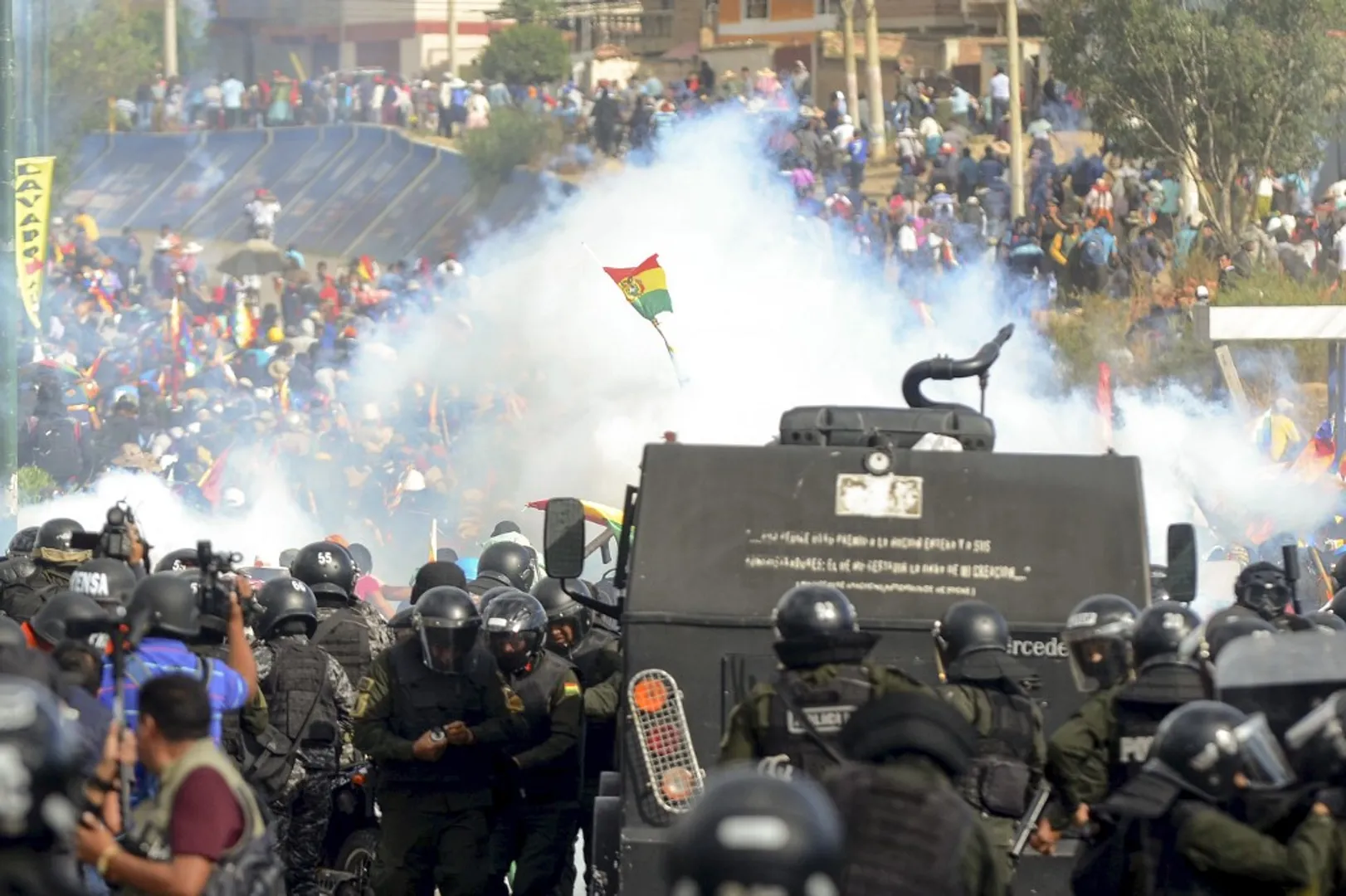 Bolivians queue for chicken and fuel as protests cripple highways