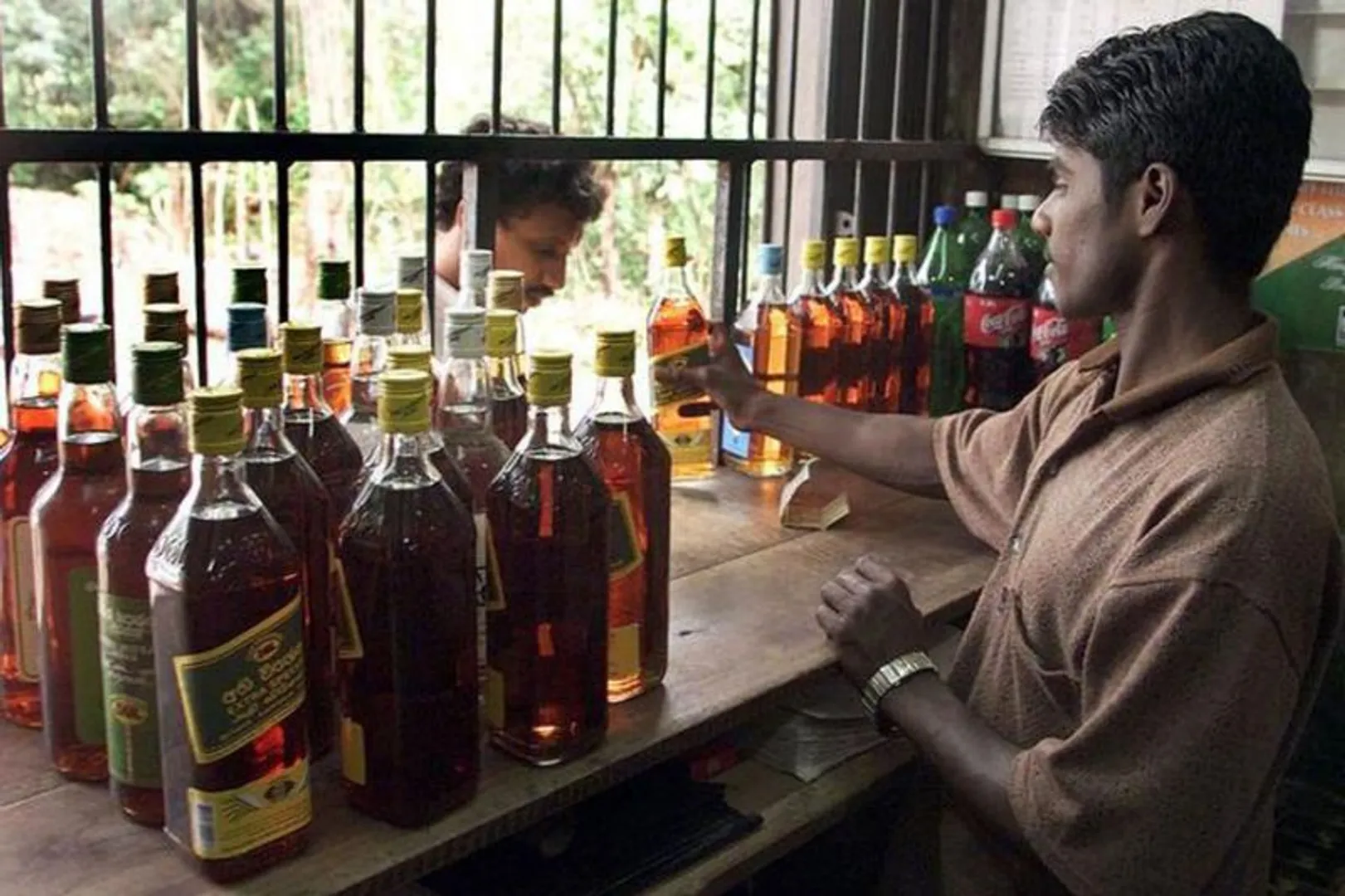 Odisha government allows over-the-counter sale of countryÂ liquor in non-containment zones