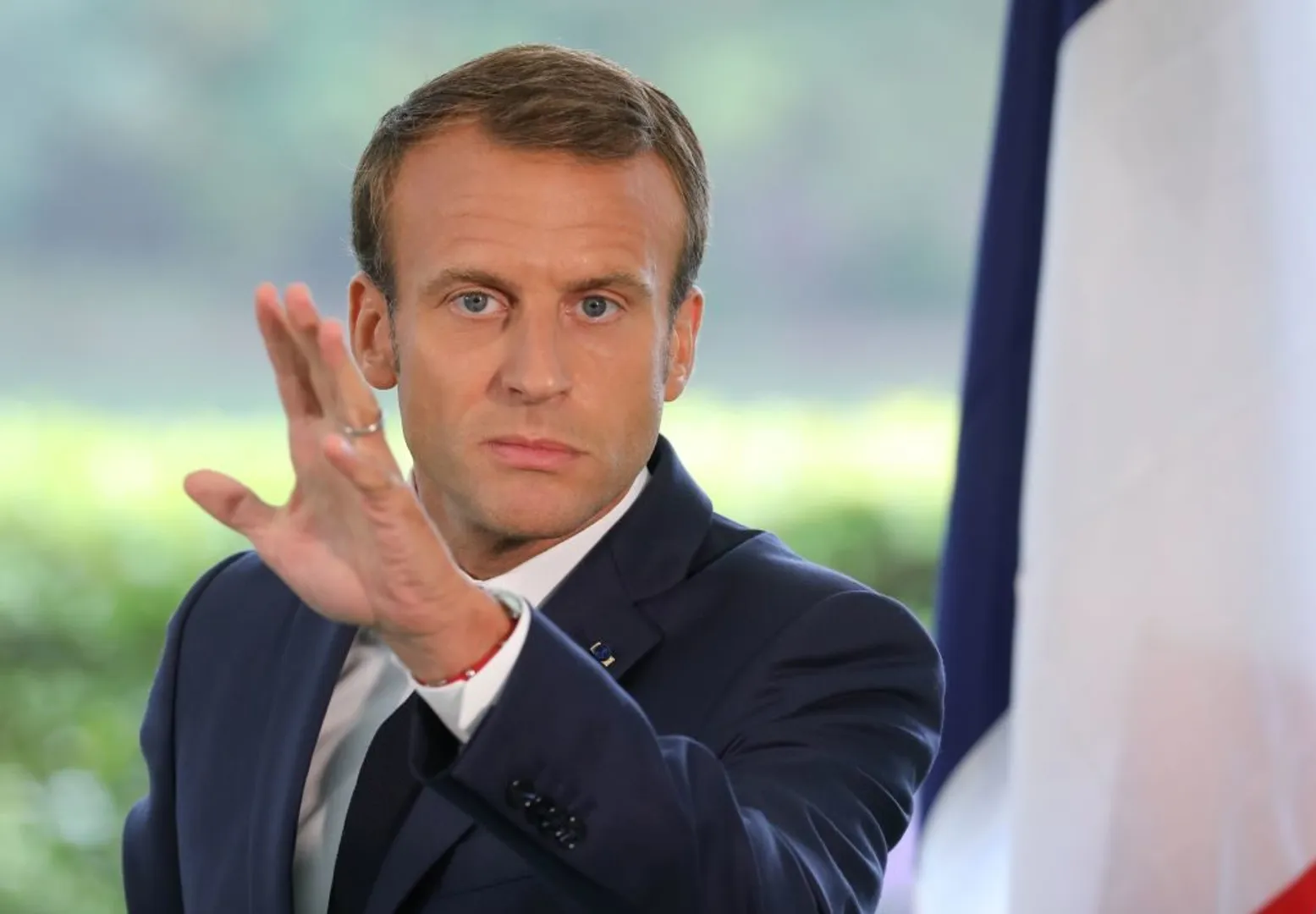 French parliament suspends debate on Macron's 'piss off' comment