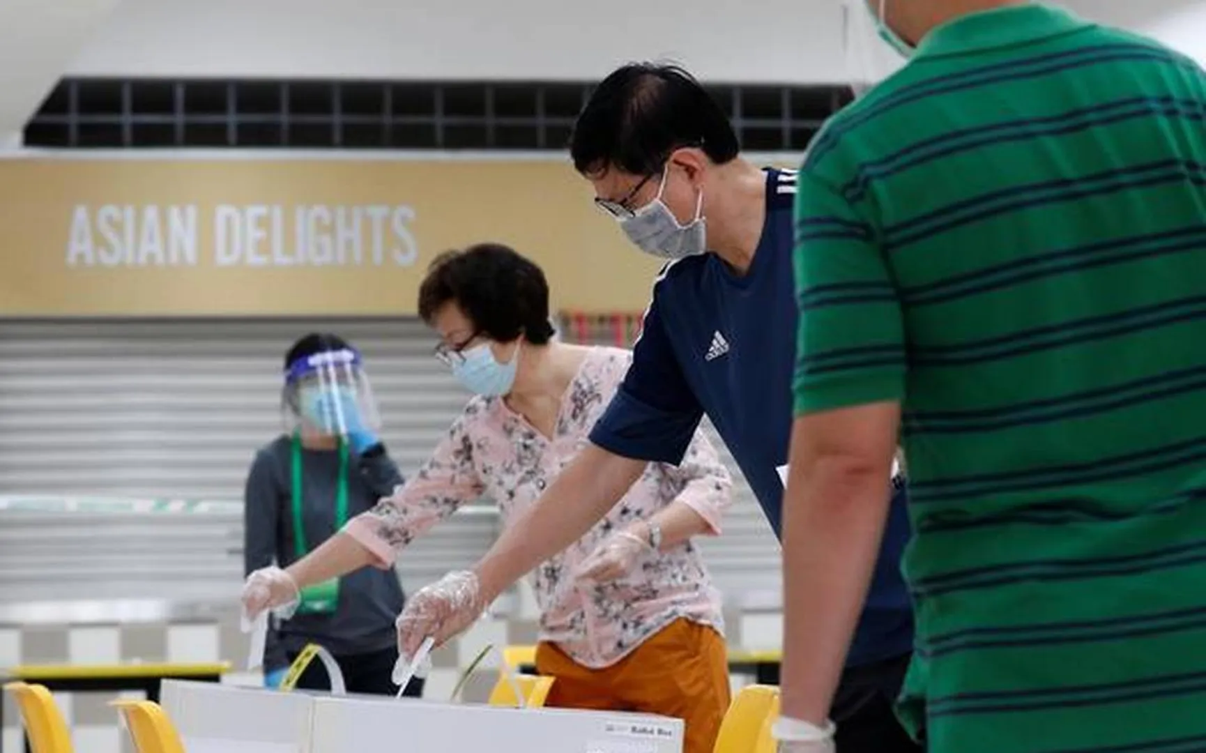 Polling underway in Singapore amid COVID-19 pandemic